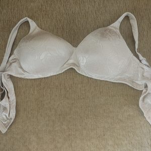 Beautiful new without tags floral beige bra